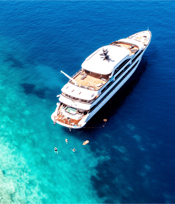 A small cruise ship in clear Adriatic water